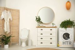 Elegant interior of modern bathroom with green plants