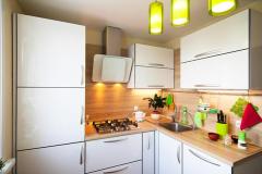Small kitchen corner with white cabinets - Asian Paints
