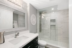 basementbathroomwithluxuriouswalkinshowerandniche